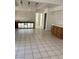 Kitchen with tile flooring, bright white walls, and an opening to another room at 5024 Saint Annes Dr, Las Vegas, NV 89149