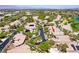 Wonderful aerial view of the house with lush landscaping, street appeal, and neighborhood at 512 Pima Canyon Ct, Las Vegas, NV 89144