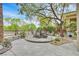 Backyard featuring desert landscaping, and an outdoor dining set at 512 Pima Canyon Ct, Las Vegas, NV 89144