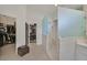 Spa-like bathroom showcasing a glass shower and walk-in closets at 512 Pima Canyon Ct, Las Vegas, NV 89144