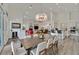 Open dining and kitchen area with vaulted ceilings and an open floor plan at 512 Pima Canyon Ct, Las Vegas, NV 89144