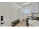 Clean laundry room with washer, dryer, and cabinets at 512 Pima Canyon Ct, Las Vegas, NV 89144