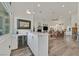 Bright living room with wine fridge and living room in the background at 512 Pima Canyon Ct, Las Vegas, NV 89144