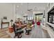 Spacious living room is brightly lit with modern furniture and vaulted ceilings at 512 Pima Canyon Ct, Las Vegas, NV 89144
