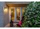 Cozy back patio featuring french doors, flowering plants, and outdoor seating that offers private outdoor relaxation at 5142 Southern Hills Ln, Las Vegas, NV 89113