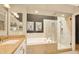 Luxurious bathroom showcasing a soaking tub, a glass-enclosed shower, and elegant fixtures for a spa-like experience at 5142 Southern Hills Ln, Las Vegas, NV 89113