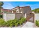 Charming courtyard gate with address plaque, enhancing privacy and adding to the property's aesthetic appeal at 5142 Southern Hills Ln, Las Vegas, NV 89113
