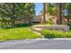 A fitness center building with manicured landscaping and palm trees at 5142 Southern Hills Ln, Las Vegas, NV 89113
