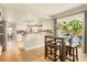 Well-lit kitchen with stainless steel appliances and an adjacent dining area at 5142 Southern Hills Ln, Las Vegas, NV 89113