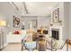 Open-concept living room with vaulted ceilings and stylish furnishings at 5142 Southern Hills Ln, Las Vegas, NV 89113