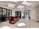 Stylish lobby with contemporary design, elegant reception desk, and comfortable seating area at 5142 Southern Hills Ln, Las Vegas, NV 89113
