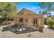 Charming home exterior with a covered patio, desert landscaping, and inviting outdoor space perfect for relaxation at 5142 Southern Hills Ln, Las Vegas, NV 89113
