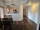 Open floor plan with a dining area next to the kitchen at 5250 S Rainbow Blvd # 1140, Las Vegas, NV 89118