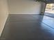 A spacious gray epoxy-coated garage at 5250 S Rainbow Blvd # 1140, Las Vegas, NV 89118