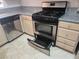 A kitchen featuring a stainless steel oven and light wood cabinets at 5250 S Rainbow Blvd # 1140, Las Vegas, NV 89118
