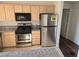 Updated kitchen features stainless steel appliances and granite counters providing a sleek aesthetic at 5250 S Rainbow Blvd # 1140, Las Vegas, NV 89118