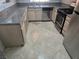 A kitchen featuring light wood cabinets and stainless steel appliances at 5250 S Rainbow Blvd # 1140, Las Vegas, NV 89118