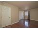 Bedroom featuring wood floors, a closet, and a well-lit window at 5383 Indian River Dr # 323, Las Vegas, NV 89103