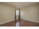 Bright bedroom featuring wood floors and a window for natural light at 5383 Indian River Dr # 323, Las Vegas, NV 89103