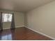 Spacious bedroom featuring beautiful wood floors and ample natural light at 5383 Indian River Dr # 323, Las Vegas, NV 89103