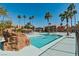 Beautiful pool area surrounded by lush palm trees, offering a relaxing outdoor oasis at 5383 Indian River Dr # 323, Las Vegas, NV 89103