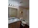 Bathroom includes a single sink vanity, a large mirror with vanity lighting, and a shower and tub combo at 555 E Silverado Ranch Blvd # 2052, Las Vegas, NV 89183