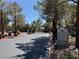 Community entrance with a decorative 'Montana' sign, trees, and gated access at 555 E Silverado Ranch Blvd # 2052, Las Vegas, NV 89183
