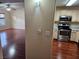 Open concept kitchen with modern appliances flows seamlessly into the cozy living area at 555 E Silverado Ranch Blvd # 2052, Las Vegas, NV 89183