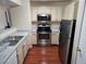 The kitchen features stainless steel appliances and ample cabinet space for storage at 555 E Silverado Ranch Blvd # 2052, Las Vegas, NV 89183