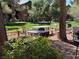 Charming picnic area with multiple tables providing outdoor seating within a well-kept green space at 555 E Silverado Ranch Blvd # 2052, Las Vegas, NV 89183