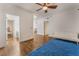 Large bonus room with hardwood floors, a ceiling fan, and plenty of natural light at 56 Grossinger Ct, Henderson, NV 89074