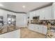 Well-equipped kitchen offers stainless appliances, granite countertops and stylish cabinetry for cooking at 56 Grossinger Ct, Henderson, NV 89074