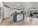 Gourmet kitchen with white cabinets, granite countertops, and stainless steel appliances for an upscale feel at 56 Grossinger Ct, Henderson, NV 89074