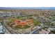 Aerial view of the community, showcasing baseball fields, homes, and landscaping at 5662 Oak Bend Dr, Las Vegas, NV 89135