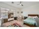 bedroom with bright, natural light, ceiling fan, and playful decor at 5662 Oak Bend Dr, Las Vegas, NV 89135