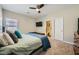 Bedroom featuring a queen bed, ensuite bathroom and walk in closet at 5662 Oak Bend Dr, Las Vegas, NV 89135