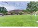 Expansive green space with manicured lawn and landscaping, perfect for outdoor activities at 5662 Oak Bend Dr, Las Vegas, NV 89135