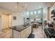 Bright kitchen with an island, pendant lighting, and stainless steel appliances at 5662 Oak Bend Dr, Las Vegas, NV 89135