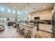 Open-concept kitchen with granite counters, stainless steel appliances and great natural light at 5662 Oak Bend Dr, Las Vegas, NV 89135