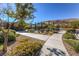 This community park features a playground and seating with mountain views at 5662 Oak Bend Dr, Las Vegas, NV 89135