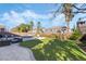 Lush backyard featuring a pool, spa, and patio, perfect for outdoor gatherings and enjoyment at 5684 Benevento Ct, Las Vegas, NV 89141