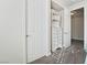 Bedroom closet features an organized storage system with shelving, drawers, and neutral decor at 5684 Benevento Ct, Las Vegas, NV 89141