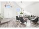 Bright living room featuring a neutral color palette, stylish furniture, and modern flooring for a serene ambiance at 5684 Benevento Ct, Las Vegas, NV 89141