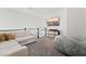 A comfortable loft area with plush seating, a large beanbag, and a modern entertainment center at 5684 Benevento Ct, Las Vegas, NV 89141