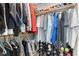 A well-organized walk-in closet offers plenty of room for hanging and folded items at 5684 Benevento Ct, Las Vegas, NV 89141
