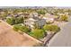 Wonderful property with a sparkling pool, lush landscaping, and solar panels on the roof at 6315 Bellisima St, Las Vegas, NV 89118