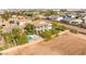 Beautiful property with a sparkling pool and spa, surrounded by lush trees and a spacious backyard at 6315 Bellisima St, Las Vegas, NV 89118