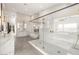 This elegant bathroom features dual sinks, a soaking tub, and a glass shower at 6315 Bellisima St, Las Vegas, NV 89118
