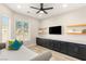 Comfortable bedroom featuring a built-in media center, soft natural light, and modern decor at 6315 Bellisima St, Las Vegas, NV 89118
