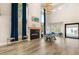 Elegant living space with high ceilings, a fireplace, and expansive windows for natural light at 6315 Bellisima St, Las Vegas, NV 89118